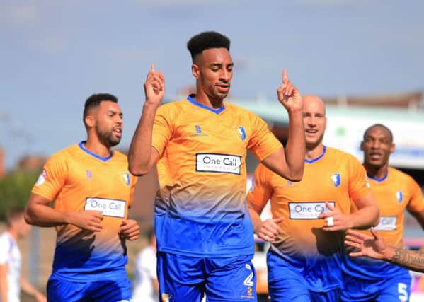 Rhys Bennett of Mansfield Town celebrates his goal for during the Sky Bet League 2 match between Mansfield Town and Luton Town at the One Call Stadium, Mansfield, England on 26 August 2017. Photo by Leila Coker.