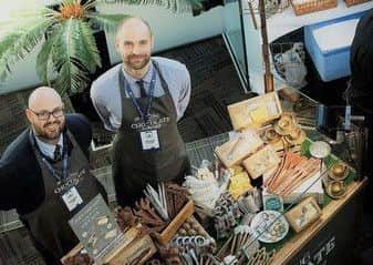 Damien Mo Toms and Ed Starr, who are enjoying the taste of success.