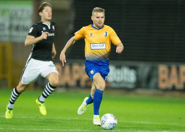 Mansfield vs Lincoln - Alfie Potter of Mansfield Town brings the ball forward - Pic By James Williamson