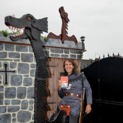 Author Frank Sharman has built dragons to illustrate his latest novel