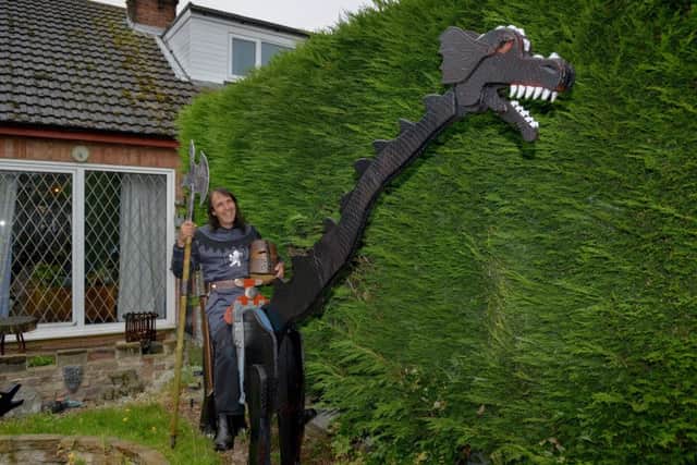 Author Frank Sharman has built dragons to illustrate his latest novel