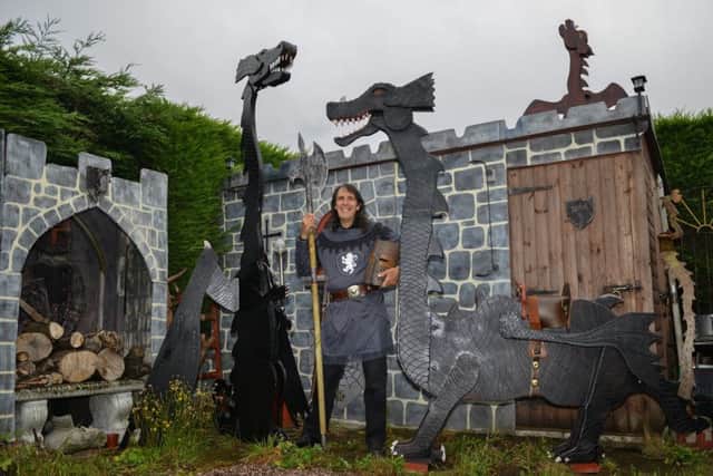 Author Frank Sharman has built dragons to illustrate his latest novel