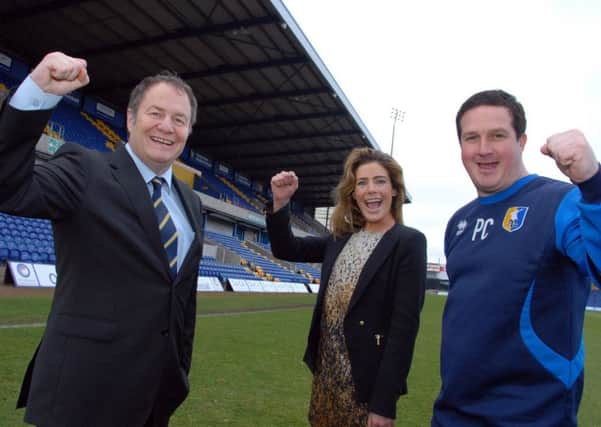 Happy days at Mansfield Town - Paul Cox, right, with chairman John Radford and CEO Carolyn Radford.