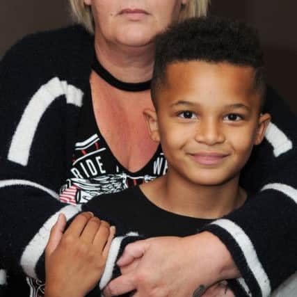 Julie Toyne and with her son Leon, 9.