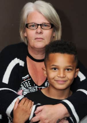 Julie Toyne and with her son Leon, 9.