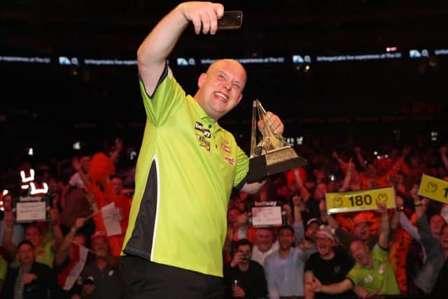 World champion Michael van Gerwen is heading for Nottingham. (PHOTO BY: Lawrence Lustig)