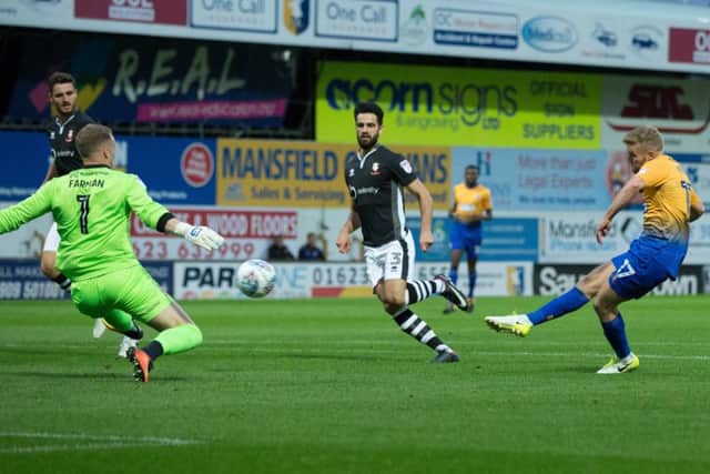Mansfield vs Lincoln - Alfie Potter of Mansfield Town scores the opening goal - Pic By James Williamson