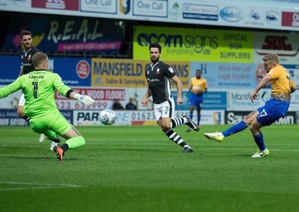 Mansfield vs Lincoln - Alfie Potter of Mansfield Town scores the opening goal - Pic By James Williamson
