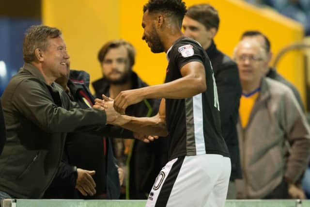 Mansfield vs Lincoln - Matt Green of Lincoln City with Mansfield town fans at full time - Pic By James Williamson