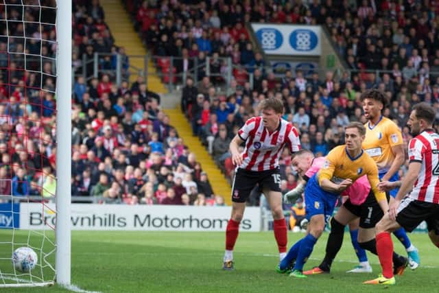 Lincoln City v Mansfield Town - Danny Rose of Mansfield Town scores the opening goal - Pic By James Williamson