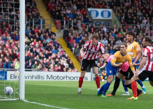 Lincoln City v Mansfield Town - Danny Rose of Mansfield Town scores the opening goal - Pic By James Williamson