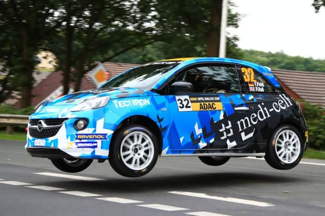 Mansfield co-driver Phil Hall with Fred Field in the Opel Adam Cup in Germany.