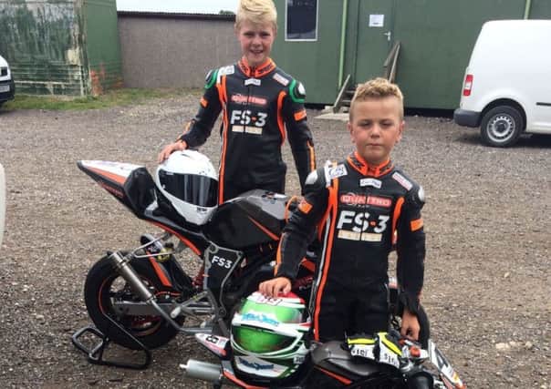 Mini-moto racing brothers Lewis and Elliot Jones.