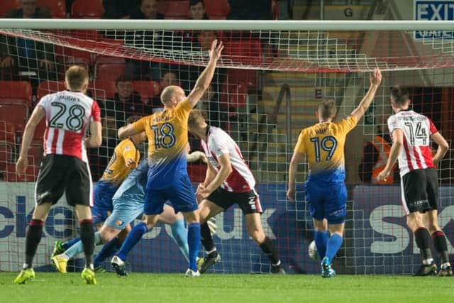 Cheltenham Town v Mansfield Town - Cheltenham have a goal ruled out for offside - Pic By James Williamson