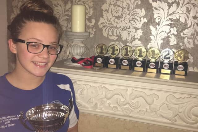 Chloe Quinn with all her trophies from the Matlock Open Meet.