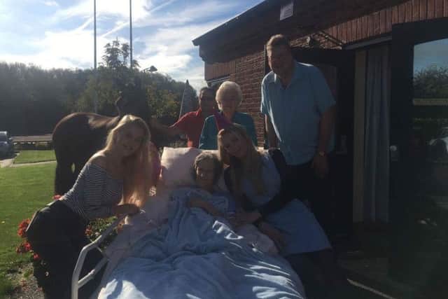 Jill Dowson 56 ,patient at Suttons John Eastwood Hospice reunited with her 13 year old pony Raffles, pictured with daughter Laura, 19.