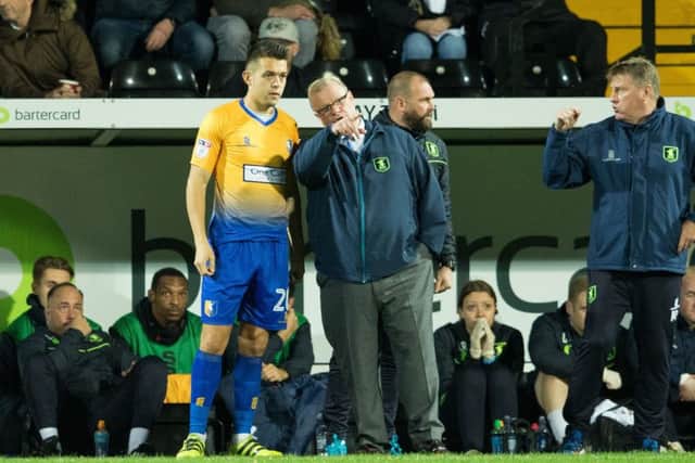 Notts County vs Mansfield Town - Jack Thomas receives last minute instructions before coming on - Pic By James Williamson