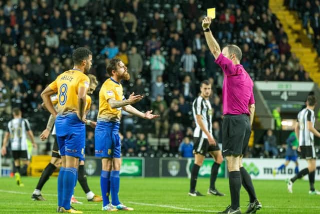 Notts County vs Mansfield Town - Paul Anderson is booked after protesting about Alan Smiths equaliser - Pic By James Williamson