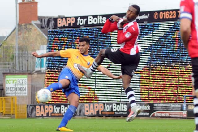 Mansfield Town v Exeter City.Jacob Mellis has a crack at goal in the second half.