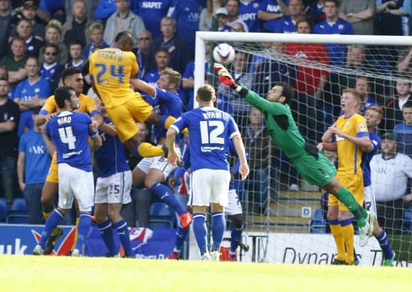 Tommy Lee stretches as he tries to stop Calvin Andrew's headed winner for Mansfield Town.
Photo by Tina Jenner