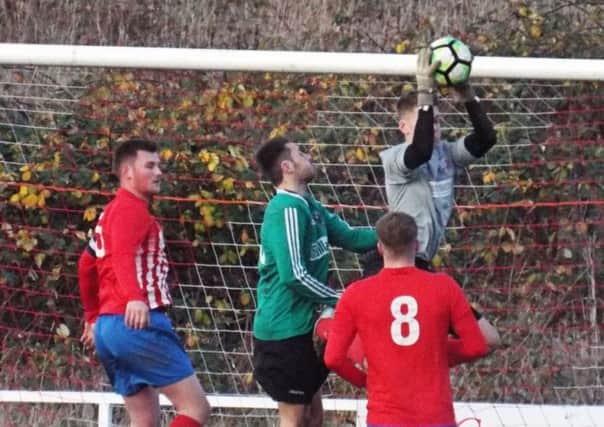 Action from Teversals 1-1 draw away to Belper United in the East Midlands Counties League on Saturday. (PHOTO BY: Keith Parnill)