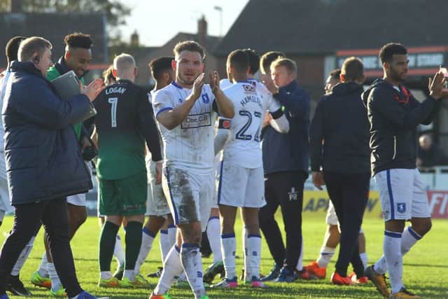 Alex McDonald of Mansfield Town thanks the fans following the 3-1 win over Shaw Lane AFC during the FA Cup match between Shaw Lane AFC and Mansfield Town at Sheerien Park, Barnsley, England on 4 November 2017 Photo by Stephen Gaunt/PRiME Media Images