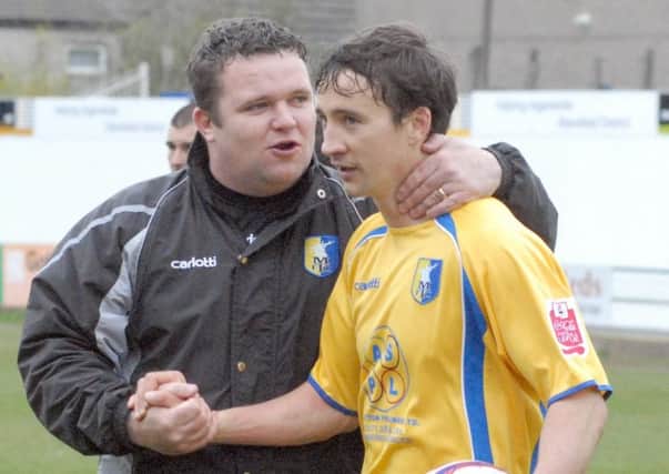 Paul Holland, left, pictured woth former Stags player Michael Boulding.