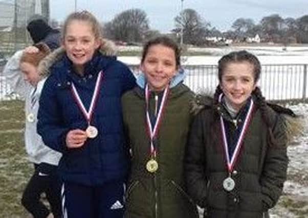 The Mansfield Harriers trio who contested the year-seven girls race, (from left) Alex Foster, Beth Hamilton and Ruby Milnes.