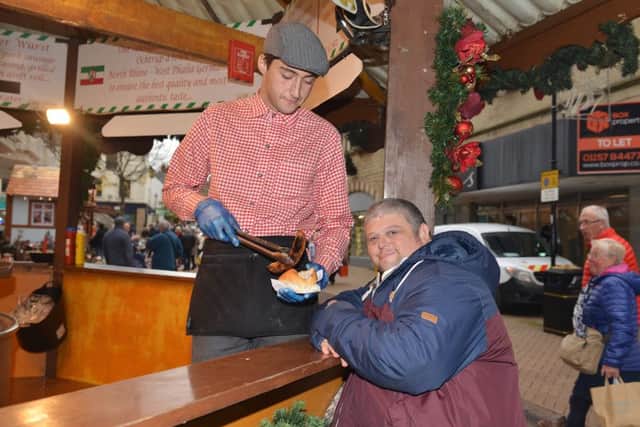 Nutcracker Christmas Market at Mansfield, pictured is James Henshaw serving Marc Farrow-Johnson