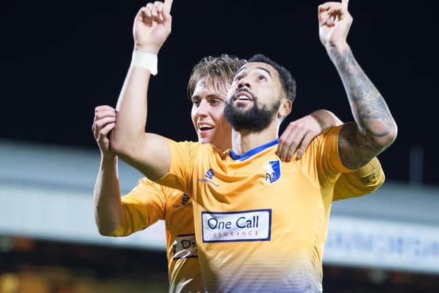 Kane Hemmings celebrates another goal for Stags in the 4-0 win at Port Vale.
