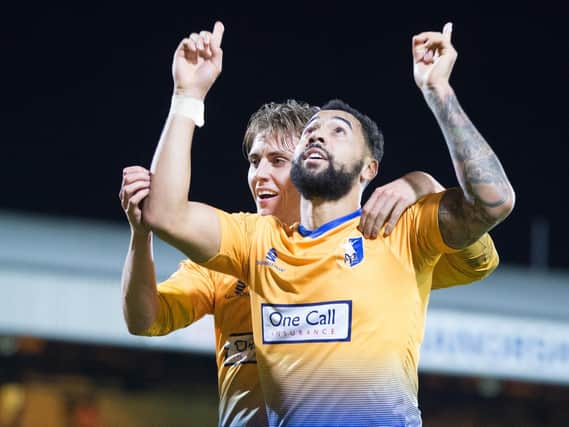Kane Hemmings celebrates another goal for Stags in the 4-0 win at Port Vale.