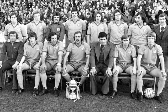 Mansfield Town's Division Three Championship presentation in 1977.   Left to right. Back row; I. McDonald, I. Wood, R. Arnold, E. Moss, K. Bird, I. McKenzie, C. Foster and B. Foster. Front row; G. Clarke, R. Cooke, K. Randall, G. Hodgsom, P. Morris. P. Matthews and B. McEwan.