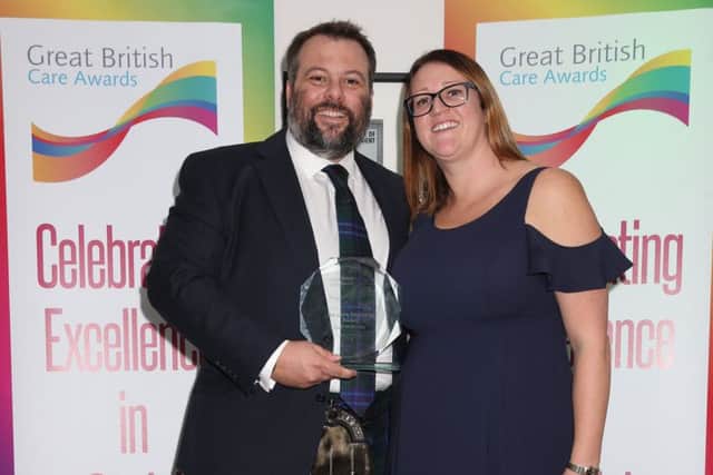 David and Eve Poxton with Ashmere Care Homes's award.