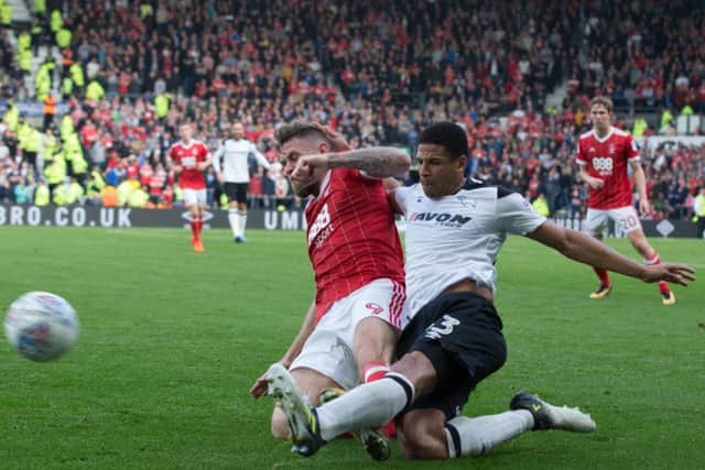 Derby County vs Nottingham Forest - Curtis Davies of Derby County battles with Daryl Murphy of Nottingham Forest - Pic By James Williamson