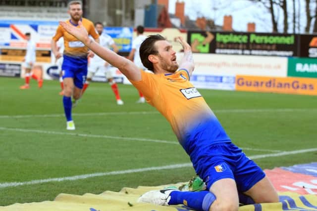 Zander Diamond celebrates his equaliser. Photo by Chris Etchells.