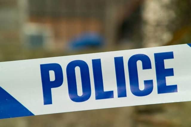 A woman has been arrested on suspicion of neglecting a child after a toddler spent the evening being looked after in a police station.