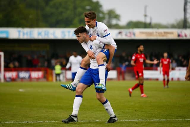 Mansfield Town's Ben Whiteman celebrates after scoring a second goal against Crawley Town - Photo by Chris Holloway