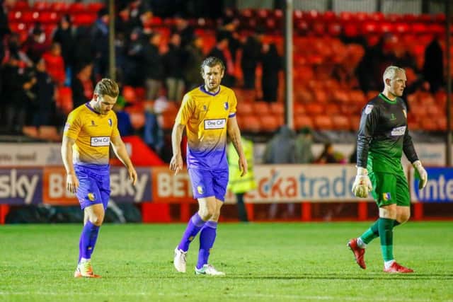 Stags troop off dejected after Saturday's defeat at Crawley. Photo by 'The Bigger Picture'