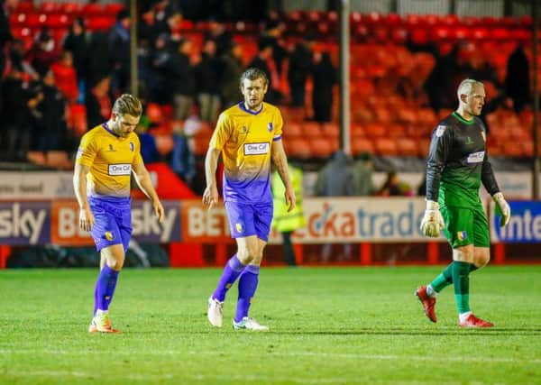 Stags troop off dejected after Saturday's defeat at Crawley. Photo by 'The Bigger Picture'