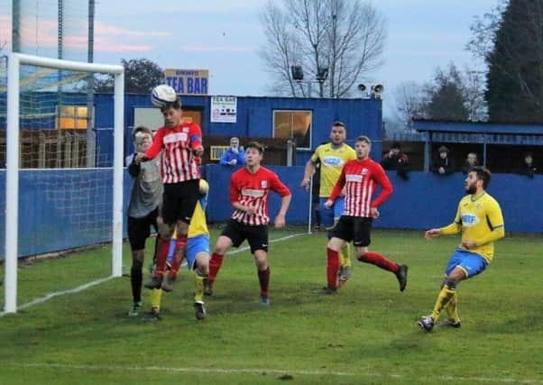 A headed clearance by a Teversal defender during their win at Gedling. (PHOTO BY: Tony Hay)