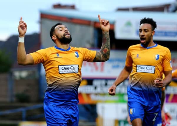 Kane Hemmings of Mansfield Town celebrates scoring during the Sky Bet League 2 match between Mansfield Town and Stevenage at the One Call Stadium, Mansfield, England on 18 November 2017. Photo by Leila Coker / PRiME Media Images.