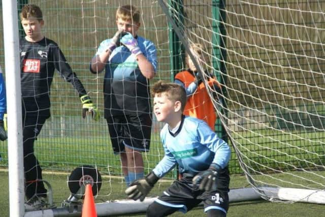 An alert young 'keeper at one of the AC1 sessions.