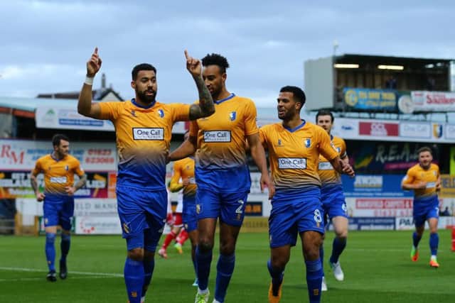 Kane Hemmings celebrates scoring Mansfield Town's first goal against Stevenage. Photo by Leila Coker / PRiME Media Images.