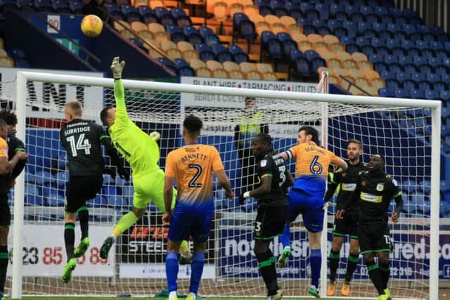 Zander Diamond (no.6) gets forward against Yeovil. Photo by Chris Etchells.