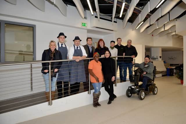 Refurbished market at Idlewells Shopping Centre, Sutton-In-Ashfield, pictured are Coun Cheryl Butler and Coun Don Davis with stall holders and customers