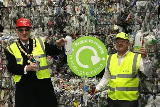 Recycle For charity - Councillor John Handley, chairman of Nottinghamshire County Council and Wayne Draycott, treatment manager at Veolia