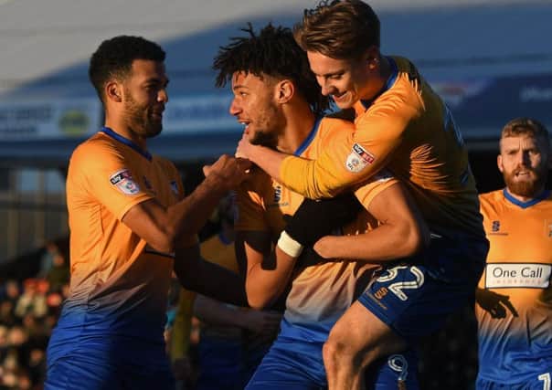 Picture Andrew Roe/AHPIX LTD, Football, EFL Sky Bet League Two, Grimsby Town v Mansfield Town, Blundell Park, 26/12/17, K.O 1pm

Mansfield's players celebrate Lee Angol's equaliser

Andrew Roe>>>>>>>07826527594