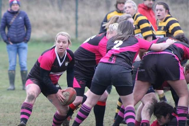 Scrum-half Danii Booth distributing the ball during Ashfield Ladies victory.