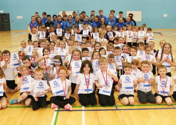 Youngsters who took part in the multi-sports festival at West Nottinghamshire College with their medals and certificates.