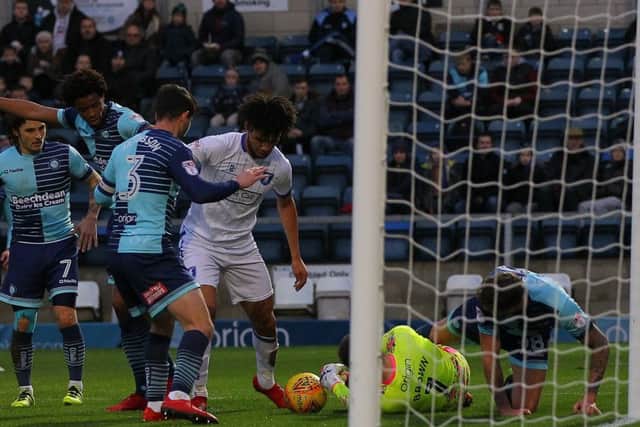 Picture by Gareth Williams/AHPIX.com; Football; Sky Bet League Two; Wycombe Wanderers v Mansfield Town; 30/12/2017 KO 15.00; Adams Park; copyright picture; Howard Roe/AHPIX.com; Wycombe keeper Scott Brown just clutches the loose ball before Lee Angol can find the finishing touch